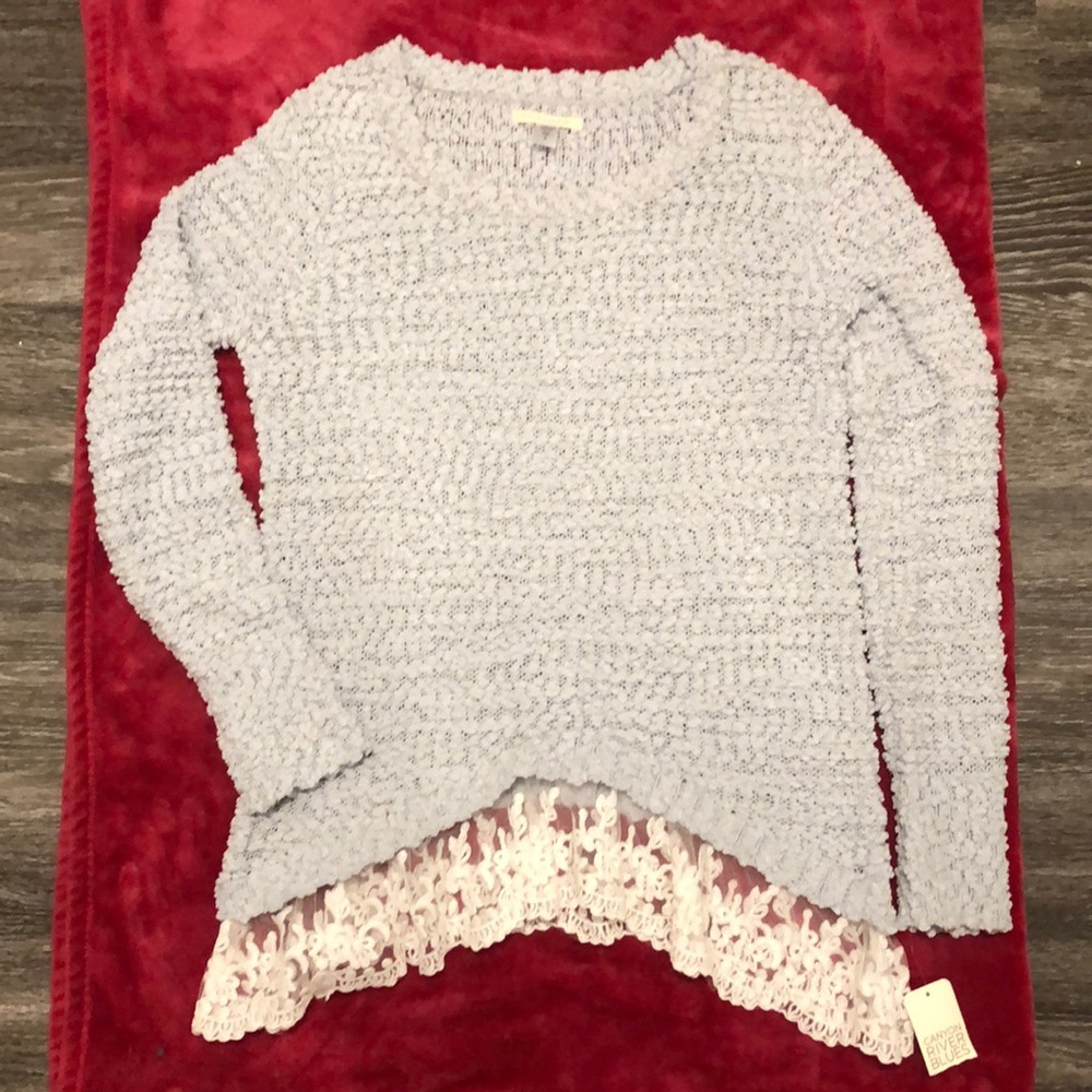 Woman’s Sweater with Lace Fringe